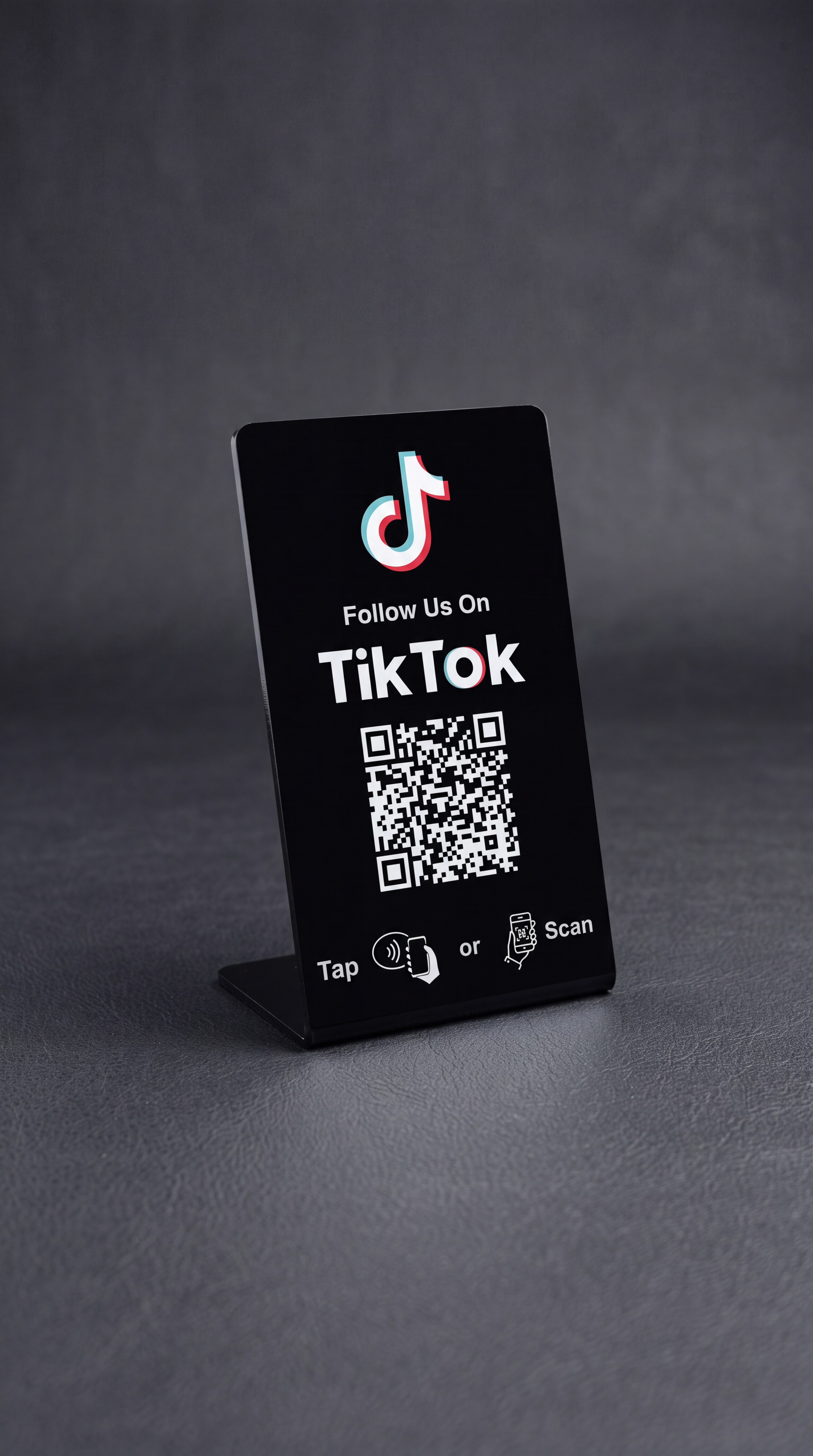 Black TikTok follow stand with QR code and tap instructions
